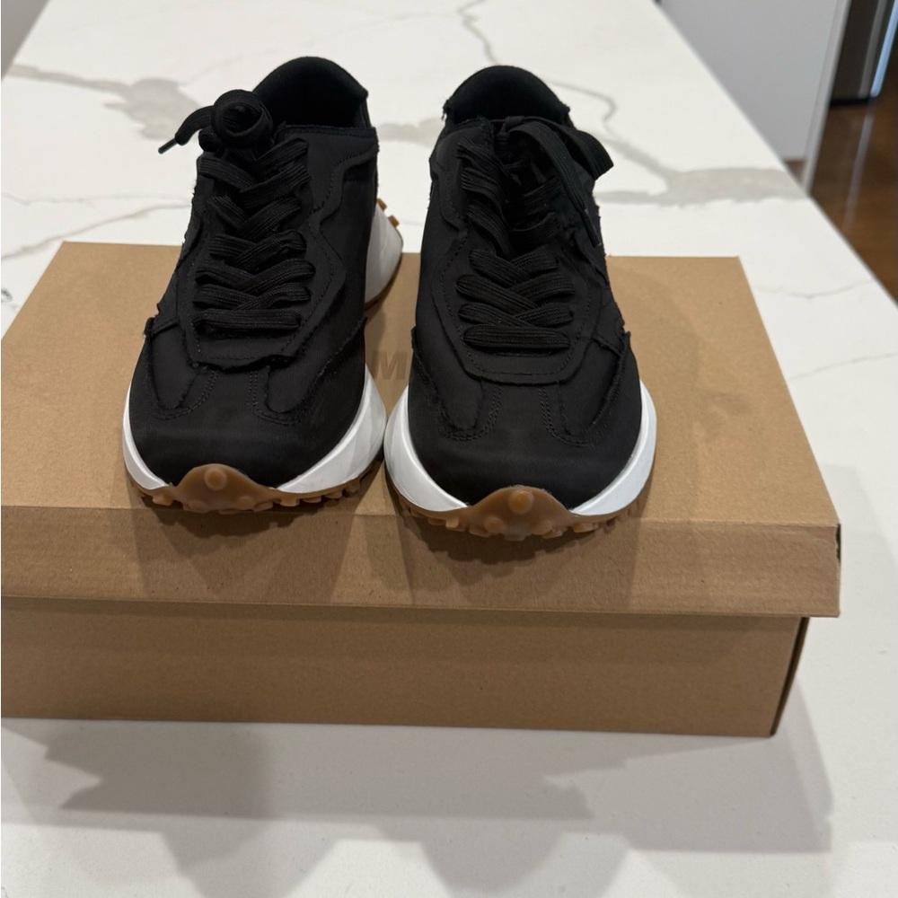 Sleek Black woman’s  Sneakers